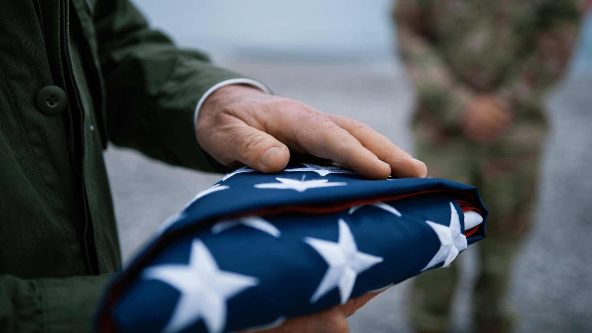 Veteran Soldier Caressing The USA Flag