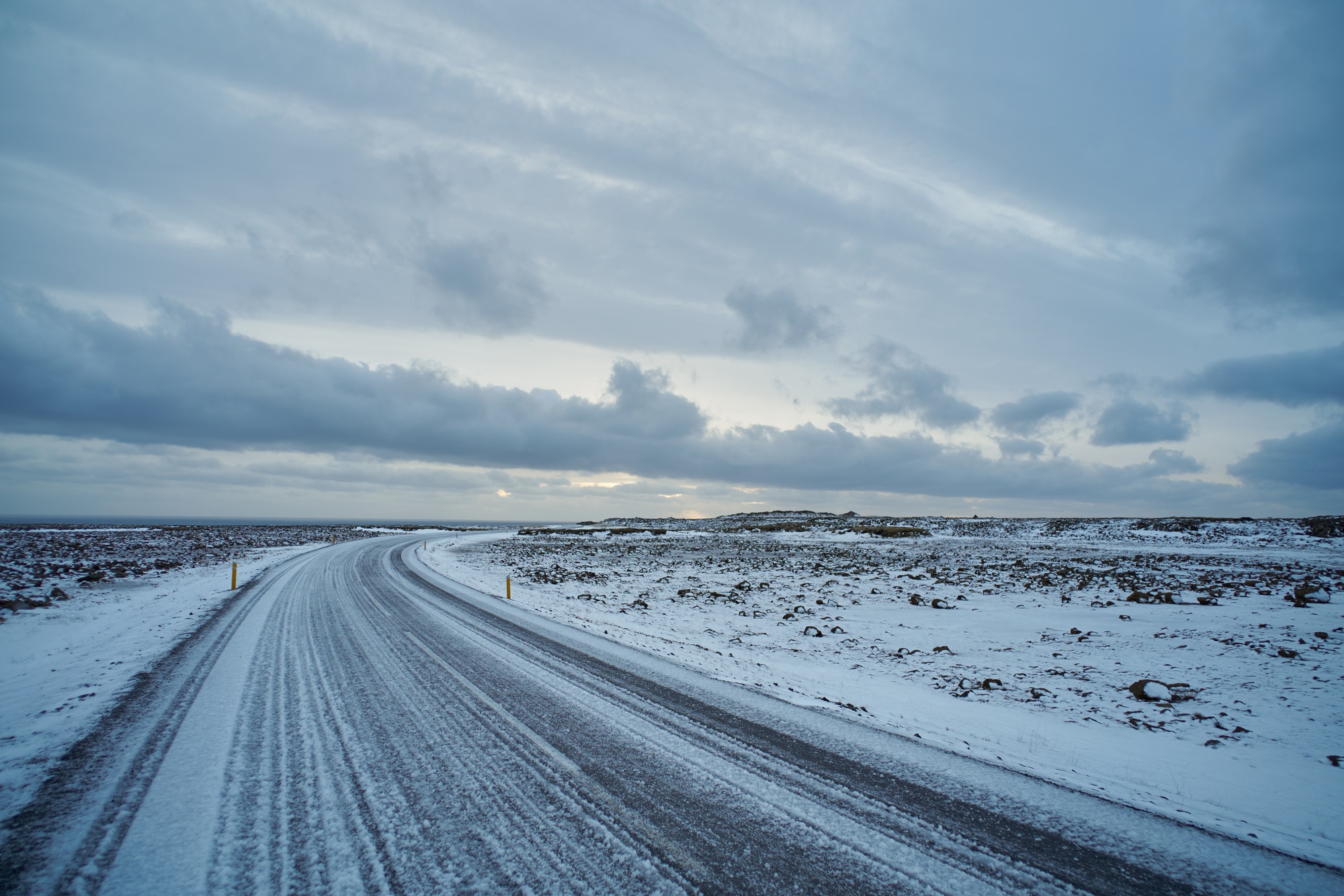 View on empty frozen road with ice