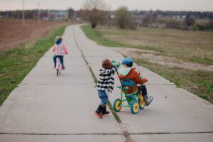 Kids playing outside in spring