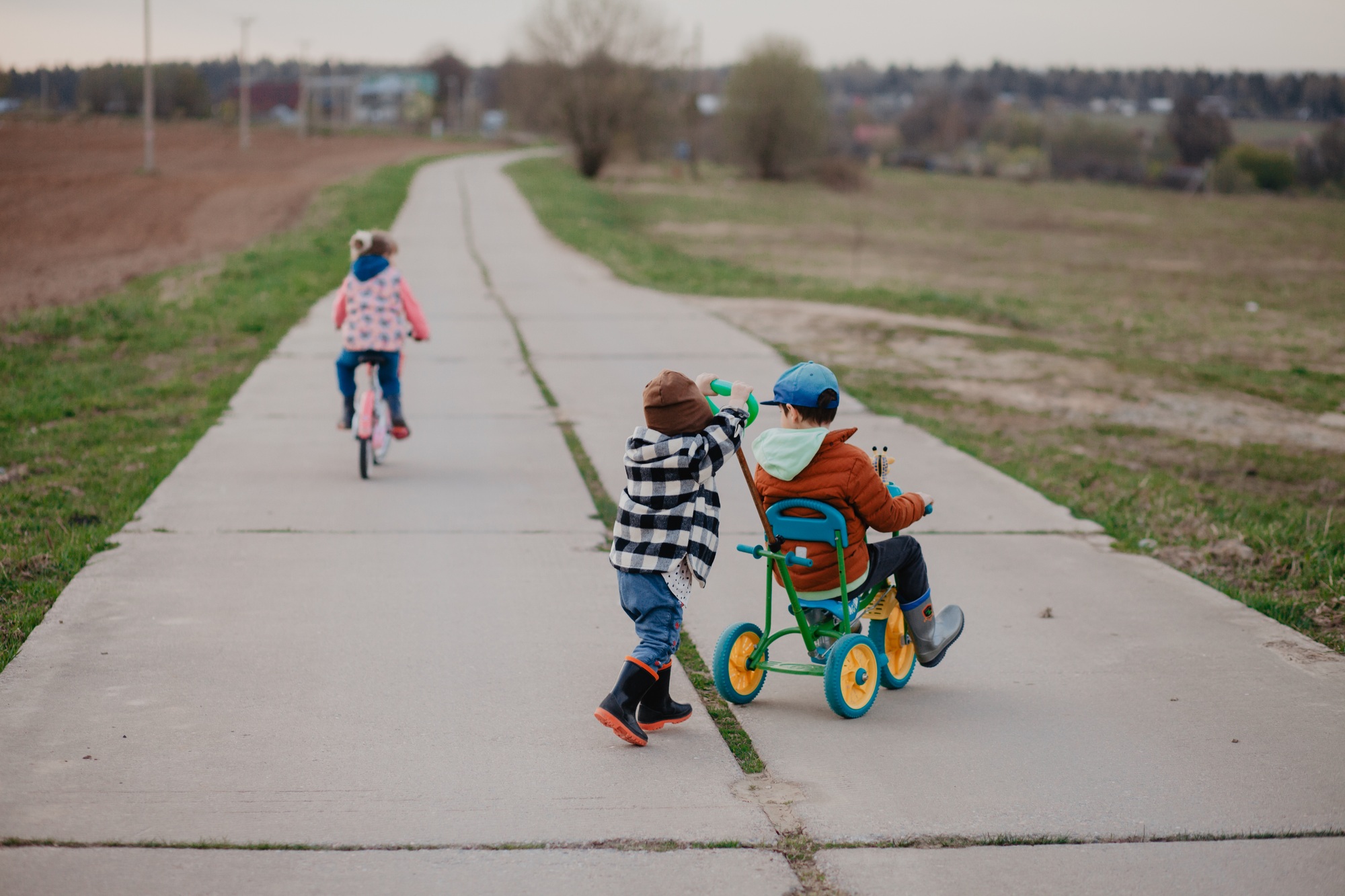 Kids playing outside in spring